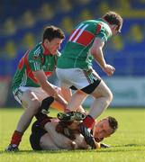 18 April 2009; John Fitzpatrick, Down, in action against Jason Doherty, left, and Frank Burke, Mayo. Cadbury Under 21 All-Ireland Football Championship Semi-Final, Mayo v Down, Pearse Park, Longford. Picture credit: Pat Murphy / SPORTSFILE