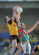 18 April 2009; Peter Fitzpatrick, Down, in action against Tom Parsons, Mayo. Cadbury Under 21 All-Ireland Football Championship Semi-Final, Mayo v Down, Pearse Park, Longford. Picture credit: Pat Murphy / SPORTSFILE