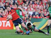 18 April 2009; Donnacha Ryan, Munster, is tackled by Niva Ta'auso, Connacht. Magners League, Munster v Connacht, Thomond Park, Limerick. Picture credit: Diarmuid Greene / SPORTSFILE