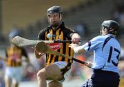 19 April 2009; J. J. Delaney, Kilkenny, clears under pressure from Dublin's David O'Callaghan. Allianz GAA National Hurling League, Division 1, Round 7, Kilkenny v Dublin, Nowlan Park, Kilkenny. Picture credit: Ray McManus / SPORTSFILE