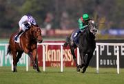 19 April 2009; Kargali, right, with Mick Kinane up, on the way to winning the Heritage Stakes ahead of eventual second place Three Rocks, with Kevin Manning up. Leopardstown Racecourse, Dublin. Photo by Sportsfile