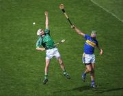 19 April 2009; Tom Condon, Limerick, and Tony Scroope, Tipperary, contest a dropping ball. Allianz GAA National Hurling League, Division 1, Round 7, Tipperary v Limerick, Semple Stadium, Thurles, Co. Tipperary. Picture credit: Brendan Moran / SPORTSFILE