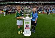 20 September 2015; Fergal O'Shea, Aghatubrid NS, Co. Kerry, and Jack Malone, St. Brendan's NS, Artane, Dublin, bring the Sam Maguire Cup onto the pitch ahead of the game. GAA Football All-Ireland Senior Championship Final, Dublin v Kerry, Croke Park, Dublin. Picture credit: Stephen McCarthy / SPORTSFILE