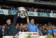20 September 2015; Conor McHugh, left, and David Byrne, Dublin, lift the Sam Maguire cup after the game. GAA Football All-Ireland Senior Championship Final, Dublin v Kerry, Croke Park, Dublin. Picture credit: Ray McManus / SPORTSFILE