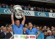 20 September 2015; Philip Ryan, Dublin, lifts the Sam Maguire cup after the game. GAA Football All-Ireland Senior Championship Final, Dublin v Kerry, Croke Park, Dublin. Picture credit: Ray McManus / SPORTSFILE
