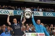 20 September 2015; Michael Savage, left, and Gavin Burke, Dublin, lift the Sam Maguire after the game. GAA Football All-Ireland Senior Championship Final, Dublin v Kerry, Croke Park, Dublin. Picture credit: Ray McManus / SPORTSFILE