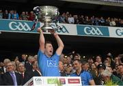 20 September 2015; Jack McCaffrey, Dublin, lifts the Sam Maguire cup after the game. GAA Football All-Ireland Senior Championship Final, Dublin v Kerry, Croke Park, Dublin. Picture credit: Ray McManus / SPORTSFILE