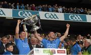 20 September 2015; Darren Daly, left, and Paul Flynn, Dublin, lift the Sam Maguire cup after the game. GAA Football All-Ireland Senior Championship Final, Dublin v Kerry, Croke Park, Dublin. Picture credit: Ray McManus / SPORTSFILE