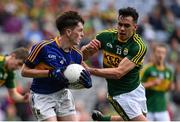 20 September 2015; Tommy Lowry, Tipperary, is tackled by Michael Foley, Kerry. Electric Ireland GAA Football All-Ireland Minor Championship Final, Kerry v Tipperary, Croke Park, Dublin. Picture credit: Ramsey Cardy / SPORTSFILE