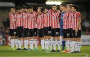 25 September 2015; The Derry City team stand for a minute's silence before the game. SSE Airtricity League Premier Division, Cork City v Derry City, Turners Cross, Cork. Picture credit: Eoin Noonan / SPORTSFILE