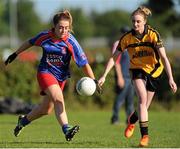 26 September 2015; Emma O'Keefe, Erin's Own, in action against Elizabeth Lory, Bennekerry/Tinryland. All-Ireland Ladies Football Club Sevens Finals, Naomh Mearnog, Portmarnock, Co. Dublin. Picture credit: Seb Daly / SPORTSFILE