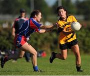 26 September 2015; Ruth Bermingham, Bennekerry/Tinryland, in action against Naimh Ni Chaoimh, Erin's Own. All-Ireland Ladies Football Club Sevens Finals, Naomh Mearnog, Portmarnock, Co. Dublin. Picture credit: Seb Daly / SPORTSFILE