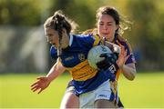 26 September 2016; Laura Carolan, Castleknock, in action against Marcela O'Reilly, Kilmacud Croke. All-Ireland Ladies Football Club Sevens Finals, Naomh Mearnog, Portmarnock, Co. Dublin. Picture credit: Seb Daly / SPORTSFILE