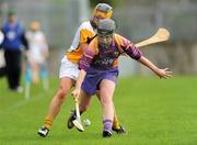 25 April 2009; Ciara O'Connor, Wexford, in action against Coleen Doherty, Antrim. Camogie National League, Division 2 Final, Antrim v Wexford, Parnell Park, Dublin. Picture credit: Pat Murphy / SPORTSFILE
