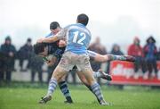 25 April 2009; Richie Mullane, Shannon, is tackled by Gerry Hurley and Conor Doyle, no.12, Garryowen. AIB League, Division 1, Semi-Final, Shannon v Garryowen, Coonagh, Limerick. Picture credit: Matt Browne / SPORTSFILE