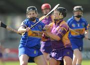 25 April 2009; Mairead Luttrell, Tipperary, in action against Ursula Jacob, Wexford. Camogie National League, Division 1 Final, Wexford v Tipperary, Parnell Park, Dublin. Picture credit: Pat Murphy / SPORTSFILE