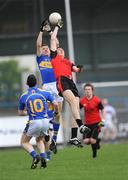 25 April 2009; Brian Jones, Tipperary, in action against Dan Gordan, Down. Allianz GAA National Football League, Division 3 Final, Down v Tipperary, Pearse Park, Longford. Picture credit: Ray McManus / SPORTSFILE