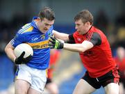 25 April 2009; Barry Grogan, Tipperary, in action against Luke Howard, Down. Allianz GAA National Football League, Division 3 Final, Down v Tipperary, Pearse Park, Longford. Picture credit: Ray McManus / SPORTSFILE