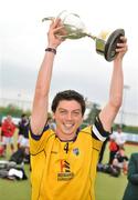 26 April 2009; Pembroke Wanderers captain Alan Giles lifts the Irish Senior cup at the end of the game. Irish Senior Men's Cup Final, Cookstown v Pembroke Wanderers, National Hockey Stadium, UCD, Dublin. Picture credit: David Maher / SPORTSFILE