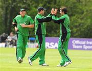 26 April 2009; Kyle McCallan, Ireland, right, celebrates with Andrew White, after taking one of his wickets. Friends Provident Trophy, Ireland v Worcestershire, Stormont, Belfast, Co. Antrim. Picture credit: Oliver McVeigh / SPORTSFILE