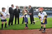 21 April 2009; Children, from left to right, Tom Kavanagh, age 6, Martha Kavanagh, age 5, both from Arklow, Co. Wicklow, and Sean McKee, age 7, from Kilkenny, with GAA President Christy Cooney, second from left, Declan Moran, left, Director Marketing and Business Development, VHI Healthcare, Dublin hurling manager Anthony Daly and former Meath player Colm O'Rourke during the launch of the 2009 VHI GAA Cúl Camps. Now in its fourth year, the Vhi GAA Cul Camps is a nationally co-ordinated programme which aims to encourage primary school children between the ages of 7 and 13 to learn and develop sporting and life-skills by participating in Gaelic games in a fun non-competitive environment. Last year over 83,000 children attended the VHI GAA Cúl Camps nationwide. Croke Park, Dublin. Picture credit: David Maher / SPORTSFILE