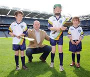 21 April 2009; Dublin senior hurling manager Anthony Daly with children, from left to right, Tom Kavanagh, age 6, Niamh Kavanagh, age 8, and Martha Kavanagh, age 5, all from Arklow, Co. Wicklow, during the launch of the 2009 VHI GAA Cúl Camps. Now in its fourth year, the VHI GAA Cul Camps is a nationally co-ordinated programme which aims to encourage primary school children between the ages of 7 and 13, to learn and develop sporting and life-skills by participating in Gaelic Games, in a fun, non-competitive environment. Last year over 83,000 children attended the VHI GAA Cúl Camps nationwide. Croke Park, Dublin. Picture credit: Diarmuid Greene / SPORTSFILE