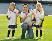 21 April 2009; Paul Brady, International handball champion, with Eimear Cahill, left, age 7 from Laragh, Co. Cavan, and Ally Cahill, age 7 from Killygarry, Co. Cavan during the launch of the 2009 VHI GAA Cúl Camps. Now in its fourth year, the VHI GAA Cul Camps is a nationally co-ordinated programme which aims to encourage primary school children between the ages of 7 and 13, to learn and develop sporting and life-skills by participating in Gaelic games, in a fun, non-competitive environment. Last year over 83,000 children attended the VHI GAA Cúl Camps nationwide. Croke Park, Dublin. Picture credit: David Maher / SPORTSFILE