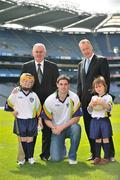 21 April 2009; GAA President Christy Cooney, left, Declan Moran, right, Director of  Marketing and Business Development, VHI Healthcare, Ross McConnell, Dublin senior team, with children Jack Keogh, age 8, from Tullaroan, Kilkenny, and Martha Kavanagh, age 5 from  Arklow, Co. Wicklow, during the launch of the 2009 VHI GAA Cúl Camps. Now in its fourth year, the VHI GAA Cul Camps is a nationally co-ordinated programme which aims to encourage primary school children between the ages of 7 and 13, to learn and develop sporting and life-skills by participating in Gaelic games, in a fun, non-competitive environment. Last year over 83,000 children attended the VHI GAA Cúl Camps nationwide. Croke Park, Dublin. Picture credit: David Maher / SPORTSFILE