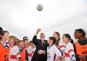 23 April 2009; GAA President Christy Cooney, with children from Scoil Bhríde Boys National School, Blanchardstown, at the launch of the new Go Games Syllabus on the GAA 125 Schools' Day. Scoil Bhríde Boys National School, Blanchardstown, Dublin. Picture credit: David Maher / SPORTSFILE