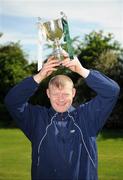 25 April 2009; Donegal SO Club captain Gareth Egan, from Lifford, Co. Donegal, with the cup after winning the Men's 11-A-Side Cup Final. Special Olympics Ireland hosted the Women's National Cup Competition and the Men's 11-A-Side National Cup Finals at the AUL Clonshaugh. Eastern Region were the overall Women's Cup Winners while Ulster won the Plate Competition. Bray Lakers SO Club contested the Men's 11-A-Side Cup Final with Donegal SO Club victorious for the 2nd year running, while Limerick Celtic SO Club won the Plate Final. AUL Clonshaugh, Dublin. Picture credit: Brian Lawless / SPORTSFILE