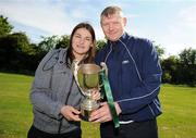 25 April 2009; World and European boxing champion Katie Taylor presents Donegal SO Club captain Gareth Egan, from Lifford, Co. Donegal, with the cup after winning the Men's 11-A-Side Cup Final. Special Olympics Ireland hosted the Women's National Cup Competition and the Men's 11-A-Side National Cup Finals at the AUL Clonshaugh. Eastern Region were the overall Women's Cup Winners while Ulster won the Plate Competition. Bray Lakers SO Club contested the Men's 11-A-Side Cup Final with Donegal SO Club victorious for the 2nd year running, while Limerick Celtic SO Club won the Plate Final. AUL Clonshaugh, Dublin. Picture credit: Brian Lawless / SPORTSFILE