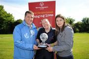 25 April 2009; Eastern Region captain Bridget O'Reilly, from Donaghmede, is presented with the trophy after winning the Women's National Cup Final, by Matt English, CEO, Special Olympics Ireland, and World and European boxing champion Katie Taylor. Special Olympics Ireland hosted the Women's National Cup Competition and the Men's 11-A-Side National Cup Finals at the AUL Clonshaugh. Eastern Region were the overall Women's Cup Winners while Ulster won the Plate Competition. Bray Lakers SO Club contested the Men's 11-A-Side Cup Final with Donegal victorious for the 2nd year running, while Limerick Celtic SO Club won the Plate Final. AUL Clonshaugh, Dublin. Picture credit: Brian Lawless / SPORTSFILE