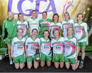 26 September 2015; Baltinglass players pose with the trophy after winning the Intermediate Championship final. All-Ireland Ladies Football Club Sevens Finals, Naomh Mearnog, Portmarnock, Co. Dublin. Picture credit: Seb Daly / SPORTSFILE