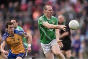 27 September 2015; Darren McLoughlin, Mohill, in action against Gerry Hickey,  Glencar-Manorhamilton. Leitrim County Senior Football Championship Final, Glencar-Manorhamilton v Mohill, Páirc Seán MacDiarmada, Carrick on Shannon, Co. Leitrim. Picture credit: David Maher / SPORTSFILE