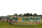 27 September 2015; Mohill players and officials stand for the National Anthem. Leitrim County Senior Football Championship Final, Glencar-Manorhamilton v Mohill, Páirc Seán MacDiarmada, Carrick on Shannon, Co. Leitrim. Picture credit: David Maher / SPORTSFILE