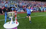27 September 2015; Dublin captain Lyndsey Davey leads her team out on to the pitch past the Brendan Martin Cup. TG4 Ladies Football All-Ireland Senior Championship Final, Croke Park, Dublin. Photo by Sportsfile