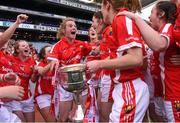 27 September 2015; Briege Corkery, Cork, celebrate with team-mates and the Brendan Martin Cup after the game. TG4 Ladies Football All-Ireland Senior Championship Final, Croke Park, Dublin. Photo by Sportsfile