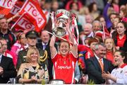 27 September 2015; Cork's Rena Buckley lifts the Brendan Martin cup. TG4 Ladies Football All-Ireland Senior Championship Final, Croke Park, Dublin. Picture credit: Ramsey Cardy / SPORTSFILE