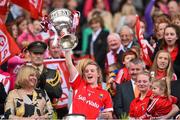 27 September 2015; Cork's Briege Corkery lifts the Brendan Martin cup. TG4 Ladies Football All-Ireland Senior Championship Final, Croke Park, Dublin. Picture credit: Ramsey Cardy / SPORTSFILE