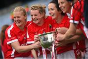 27 September 2015; Cork's Deirdre O’Reilly, Briege Corkery, Geraldine O'Flynn and Valerie Mulcahy celebrate with the Brendan Martin cup. TG4 Ladies Football All-Ireland Senior Championship Final, Croke Park, Dublin. Picture credit: Ramsey Cardy / SPORTSFILE
