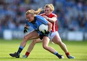 27 September 2015; Carla Rowe, Dublin, is tackled by Briege Corkery, Cork. TG4 Ladies Football All-Ireland Senior Championship Final, Croke Park, Dublin. Picture credit: Ramsey Cardy / SPORTSFILE