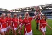 27 September 2015; Róisin Phelan, Cork, celebrates with the Brendan Martin Cup after the game. TG4 Ladies Football All-Ireland Senior Championship Final, Croke Park, Dublin. Photo by Sportsfile