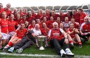 27 September 2015; The Cork team together with manager Eamonn Ryan and selector Frankie Honohan, left, celebrate with the Brendan Martin Cup after the game TG4 Ladies Football All-Ireland Senior Championship Final, Croke Park, Dublin. Photo by Sportsfile