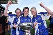 27 September 2015; Waterford players, from left, Aileen Wall, captain Linda Wall, and Mairéad Wall, celebrate with the Mary Quinn Memorial Cup after the game. TG4 Ladies Football All-Ireland Intermediate Championship Final, Kildare v Waterford, Croke Park, Dublin. Photo by Sportsfile