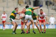 26 April 2009; Fergal Doherty, Derry, in action against  Kerry players, from left, Tommy Griffin, Anthony Maher and Donnacha Walsh. Allianz GAA National Football League, Division 1 Final, Kerry v Derry, Croke Park, Dublin. Picture credit: Stephen McCarthy / SPORTSFILE