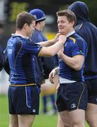28 April 2009; Leinster's Gordon D'Arcy, left, helps team-mate Brian O'Driscoll with the collar of his jersey during squad training ahead of their Heineken Cup semi-final against Munster on Saturday. RDS, Dublin. Picture credit: Brendan Moran / SPORTSFILE