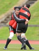 28 April 2009; Munster's Alan Quinlan, left, is tackles team-mate Denis Leamy during squad training ahead of their Heineken Cup semi-final against Leinster on Saturday. University of Limerick, Limerick. Picture credit: Diarmuid Greene / SPORTSFILE