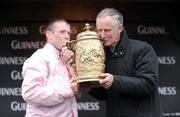 29 April 2009; Trainer Jim Dreaper and jockey Andrew Lynch after winning the Punchestown Guinness Gold Cup with Notre Pere. 2009 Punchestown Irish National Hunt Festival, Punchestown Racecourse, Co. Kildare. Picture credit: Matt Browne / SPORTSFILE