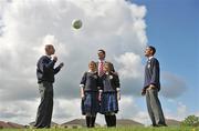 27 April 2009; Sunderland chairman and former Republic of Ireland international Niall Quinn with pupils, from Balbriggan Community College, left to right, Krzysztof Gluch, Indre Surkute, Ola Sajon and Refat Shafaq at the launch of the Sporting Fingal Community Trust. Balbriggan Community College, Balbriggan, Dublin. Picture credit: David Maher / SPORTSFILE