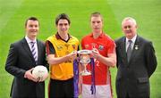 28 April 2009; Shane Guest, left, Cadbury Senior Brand manager, with GAA President Christy Cooney, far right, Down captain Timmy Hanna, second from left, and Cork captain Colm O'Neill ahead of the Cadbury GAA Football U21 All-Ireland Final to be played in O'Moore Park, Portlaoise, on Monday the 4th of May. Croke Park, Dublin. Picture credit: David Maher / SPORTSFILE